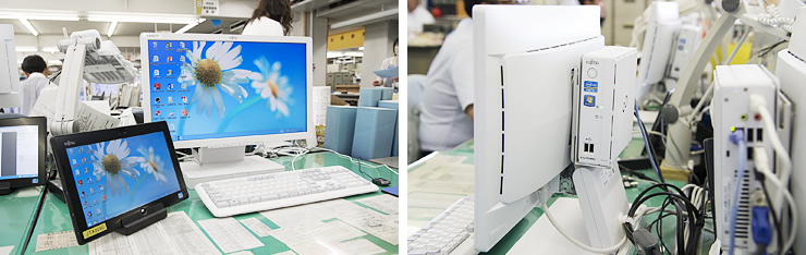 写真 2：住民情報や税務を扱う部署では、大型ディスプレイ背面に基幹系専用の小型PCを設置。ディルプレイとキーボードを切替機によりタブレットと共有している。